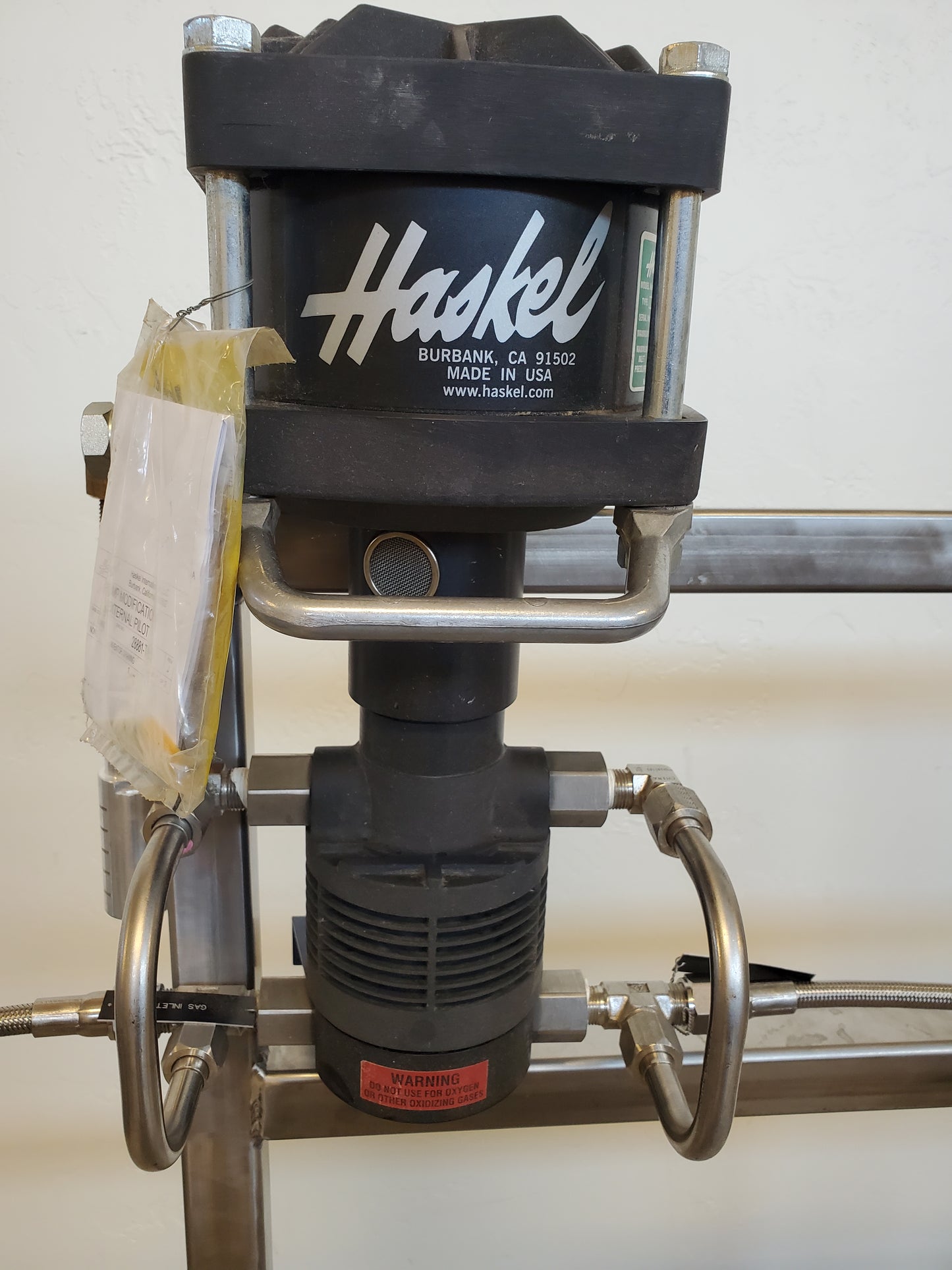 Haskel extraction pump and coiling coil combination